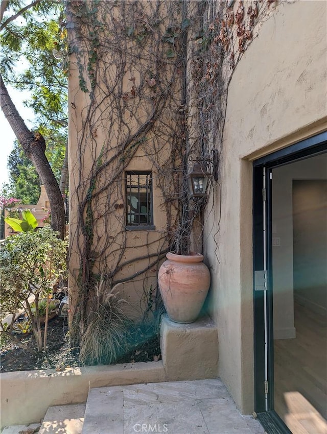 exterior space with stucco siding