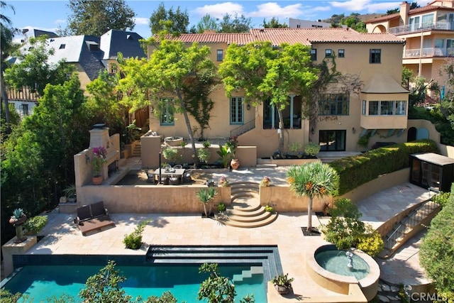 pool with a patio