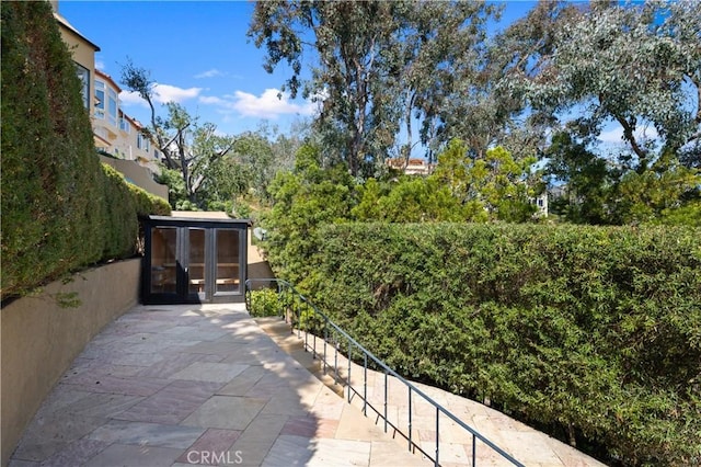 view of patio with an outdoor structure