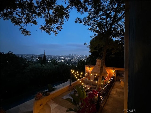 2618 Nottingham Ave, Los Angeles, CA 90027 - view of patio / terrace with a fireplace