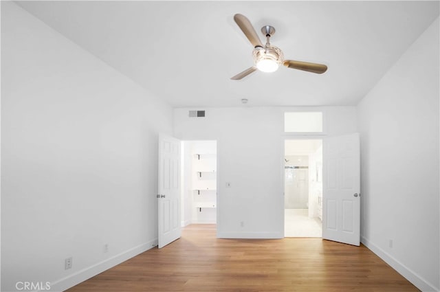 unfurnished bedroom with light hardwood / wood-style floors and ceiling fan