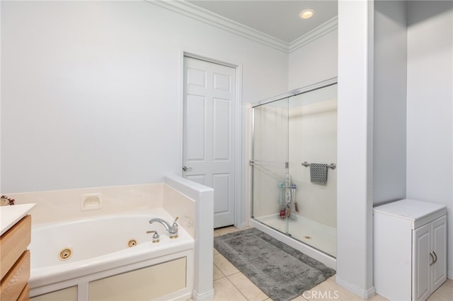 bathroom with tile patterned floors, crown molding, separate shower and tub, and vanity