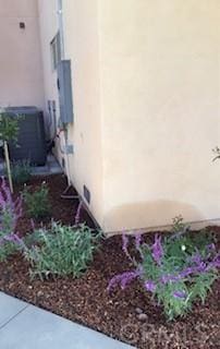 view of home's exterior with central air condition unit