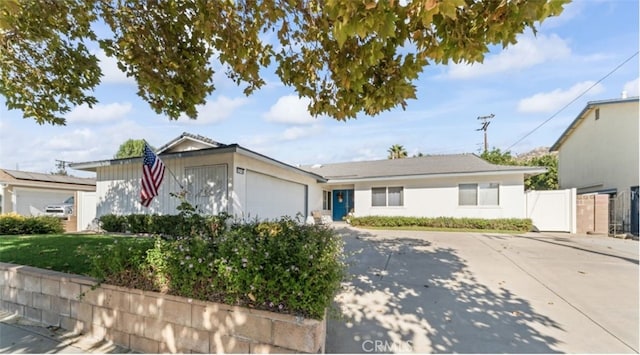 single story home featuring a garage