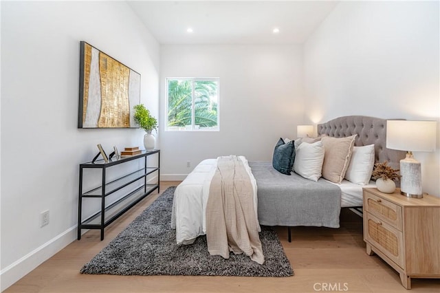 bedroom featuring light hardwood / wood-style floors