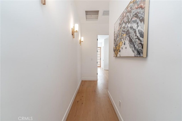 hallway featuring light wood-type flooring