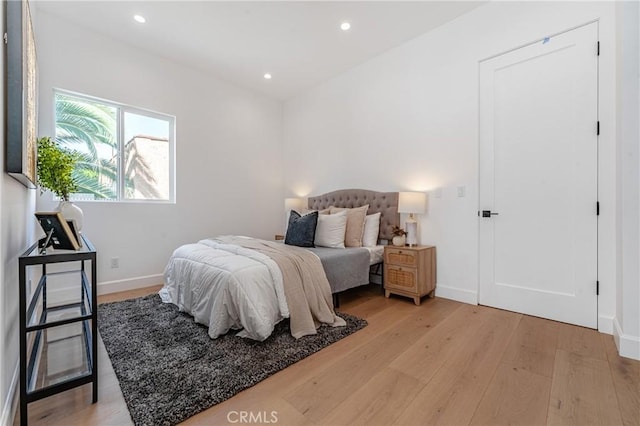 bedroom featuring light hardwood / wood-style floors