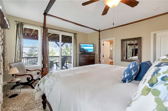 bedroom featuring access to exterior, ensuite bath, ceiling fan, and crown molding