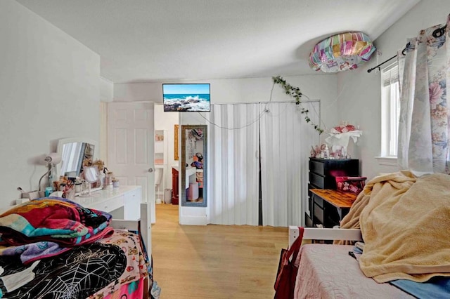 bedroom featuring light hardwood / wood-style floors