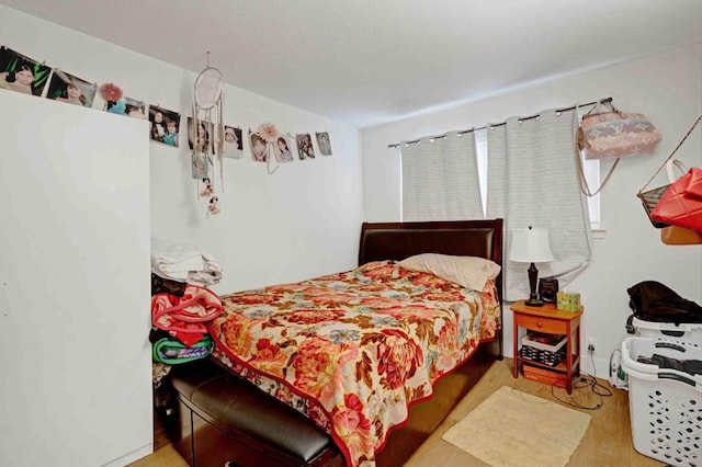 bedroom featuring light hardwood / wood-style flooring