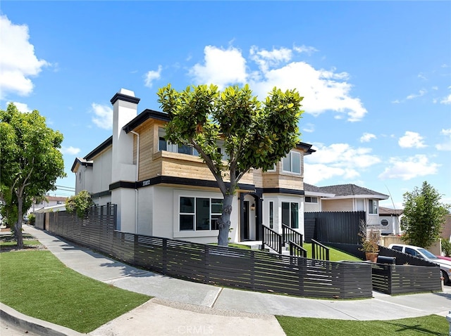 view of front of home with a front yard