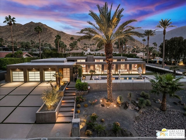 view of front of home featuring a mountain view