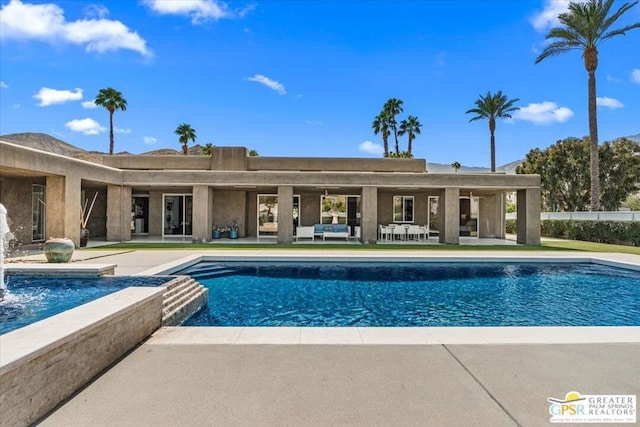 view of pool featuring a patio area