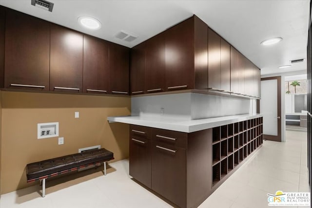 kitchen with dark brown cabinets