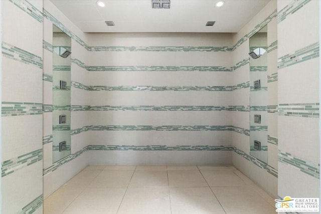 bathroom featuring a shower and tile patterned floors