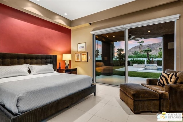 tiled bedroom with access to exterior and a mountain view