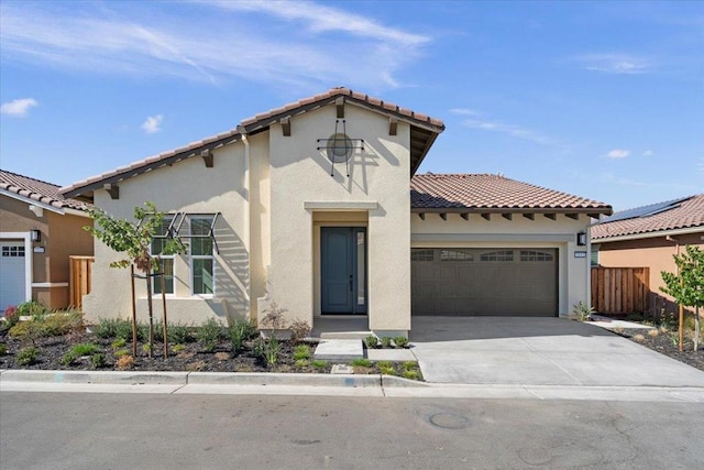 mediterranean / spanish-style home featuring a garage