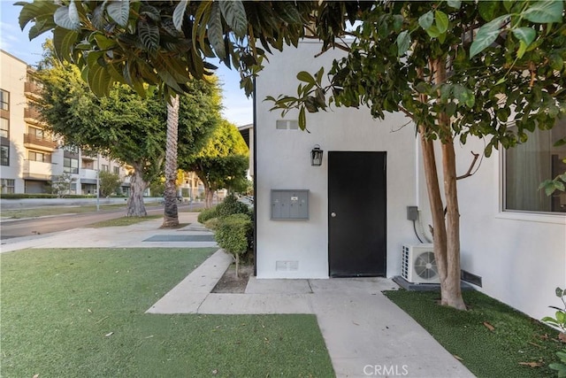 entrance to property featuring ac unit