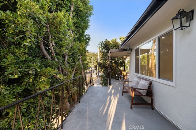 view of patio / terrace with a balcony