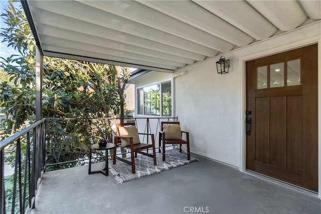 view of patio with a balcony