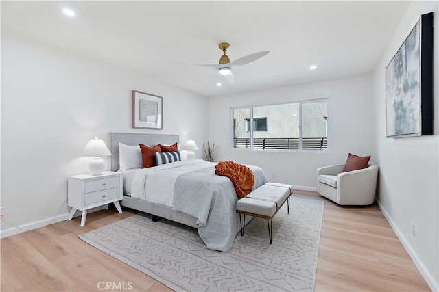 bedroom featuring ceiling fan and light wood-type flooring