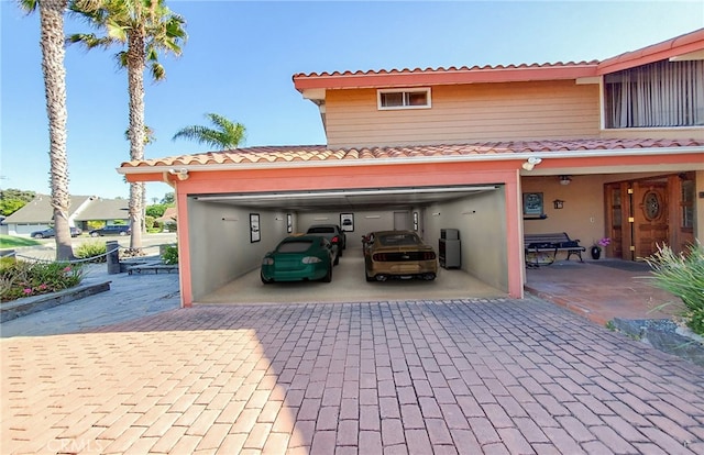 exterior space with decorative driveway