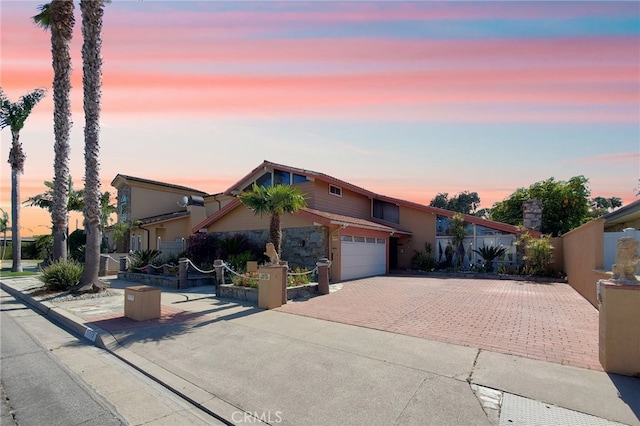 view of front of house with a garage