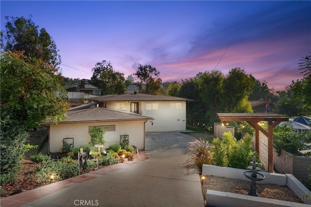 view of property exterior at dusk