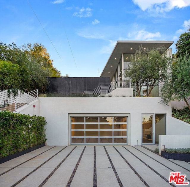 view of front of home with a balcony