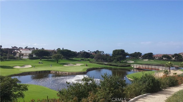 view of home's community featuring a water view