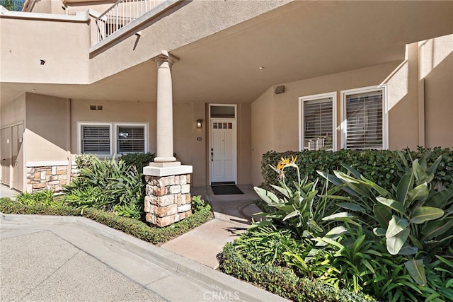 property entrance with a balcony