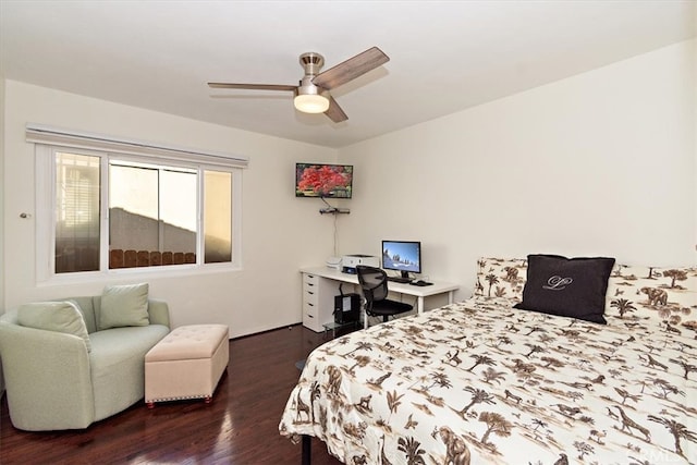 bedroom with ceiling fan and dark wood-type flooring