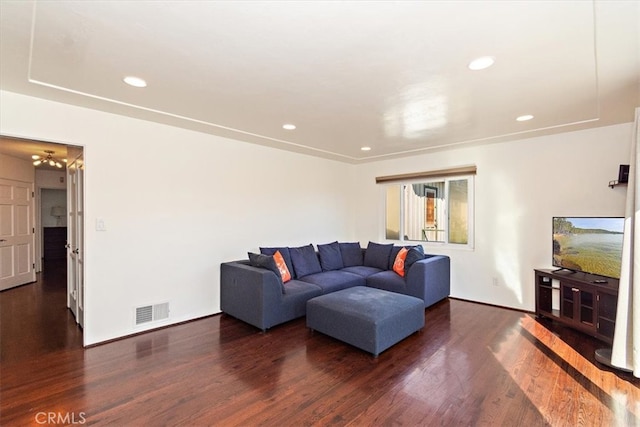 living room featuring dark wood-type flooring