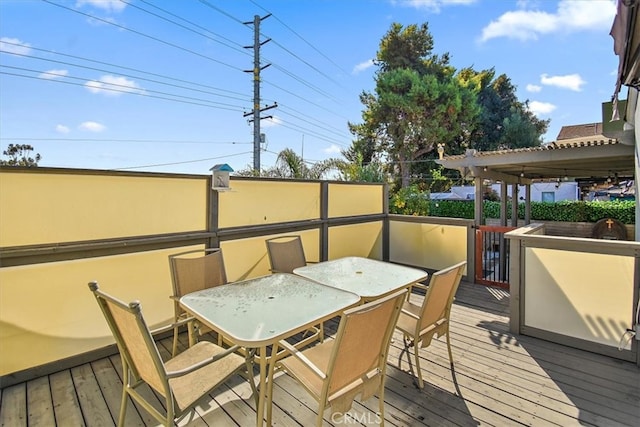 wooden deck featuring a pergola