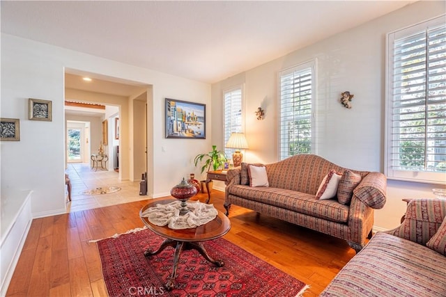 living room with light hardwood / wood-style floors