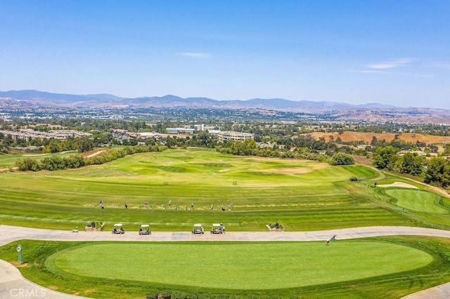 surrounding community featuring a mountain view