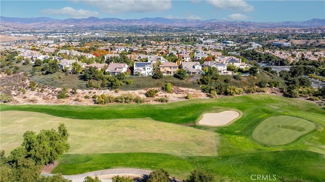 birds eye view of property featuring a mountain view