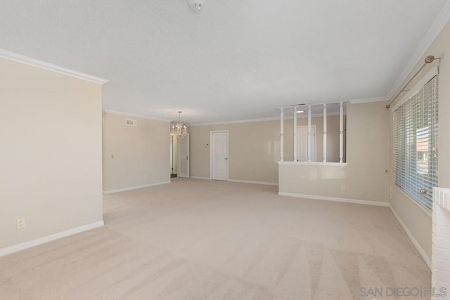 unfurnished room featuring light carpet, a chandelier, and crown molding