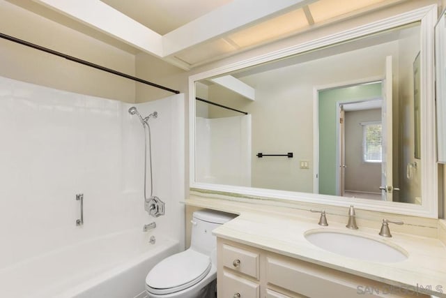 full bathroom with washtub / shower combination, vanity, and toilet