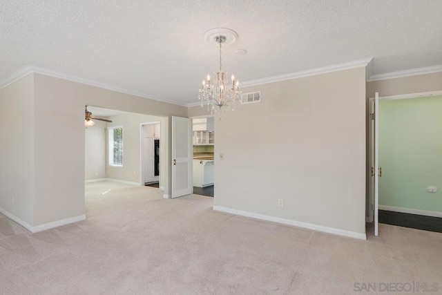 carpeted empty room featuring a textured ceiling, ceiling fan with notable chandelier, and ornamental molding