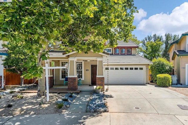 view of front of property with a garage and a porch