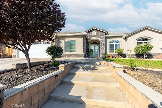 view of front of property with a garage