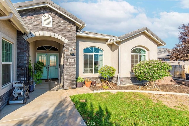 doorway to property featuring french doors