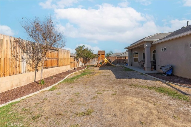 view of yard with a playground