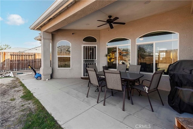 view of patio / terrace featuring ceiling fan