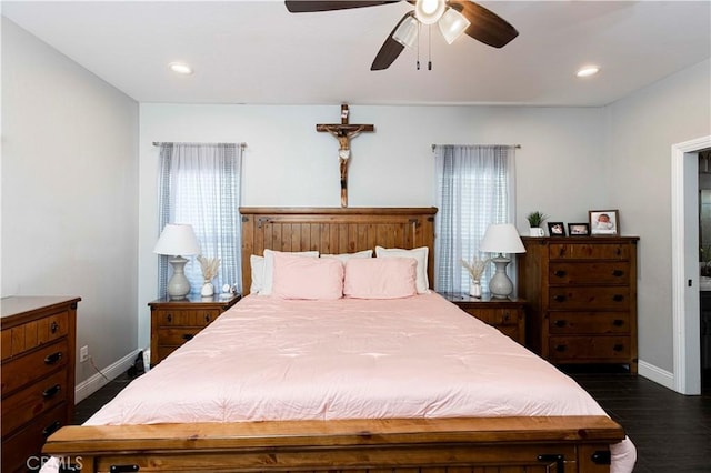 bedroom featuring ceiling fan and dark wood-type flooring