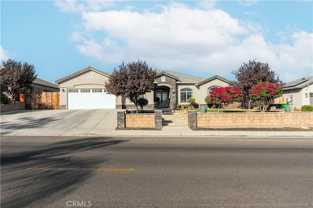 view of front of property featuring a garage