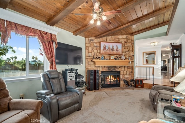 living room with lofted ceiling with beams, ceiling fan, wooden ceiling, light hardwood / wood-style flooring, and a fireplace