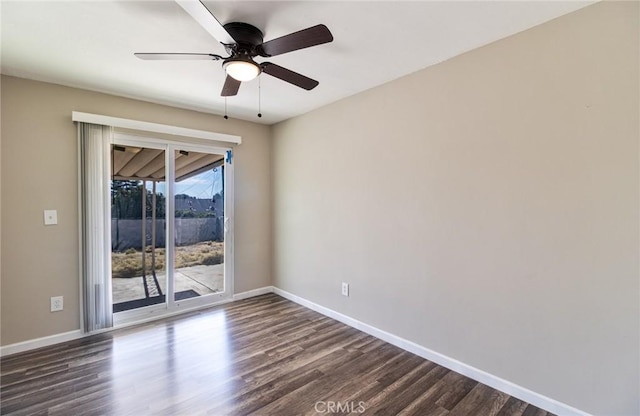 unfurnished room featuring ceiling fan and dark hardwood / wood-style flooring