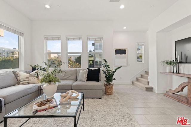 living room with light tile patterned floors